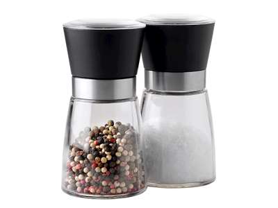 Salt and pepper grinder in glass with black lid